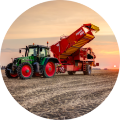 Muurcirkel Tractor met Aardappelrooier Zonsondergang