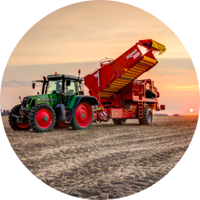 Muurcirkel Tractor met Aardappelrooier Zonsondergang